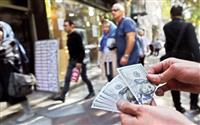 معمای ارزان‌فروشی دلار در تهران / چرا دلالان ایران‌چک می‌خواهند؟